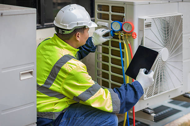 Professional Heat Pump Repair technician working in Covington, IN